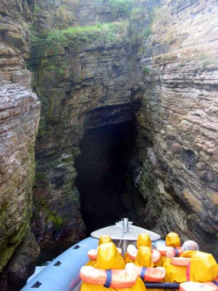 Entering a cave on Stroma