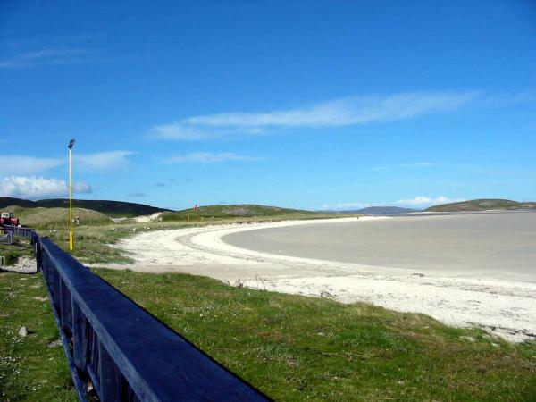 Barra Isle Airport, this believe it or not, is the runway!
Planes only land at low tide.
The "terminal building" is 20 yds. away on your left.