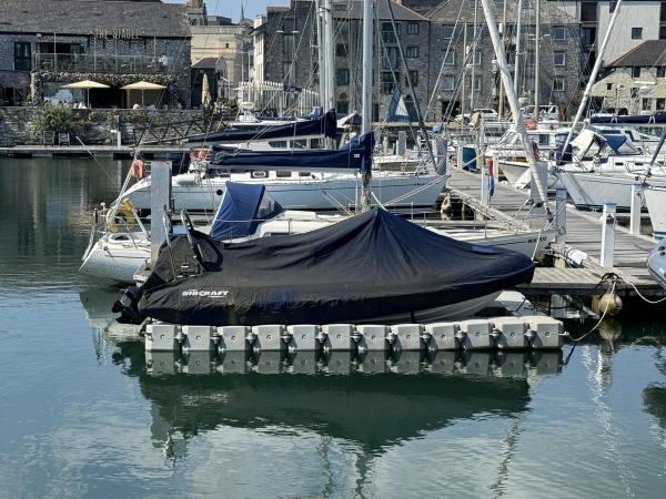 Covered on the dock in Sutton Harbour