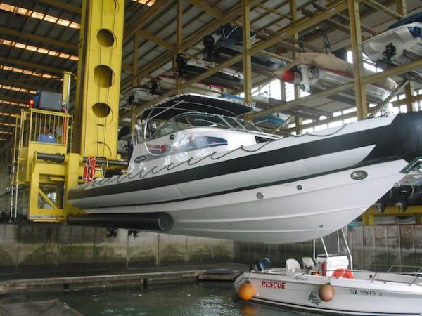 Launching from boat-house, Raffles Marina, on Johor River, Singapore