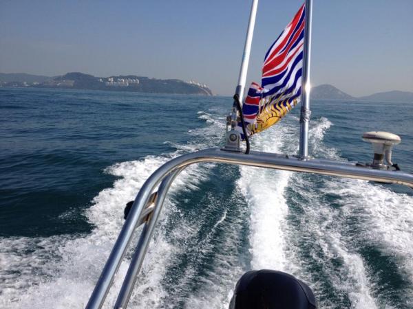 cruizing out... past Stanley peninsula, Hong Kong Island (in the distance)