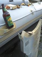 A beer goes a long way when sanding a now dry transom.