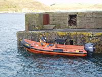 Humber Destroyer 5.8 and Yamaha F115. Very fast and really stable at 40 kts, a great sea boat.