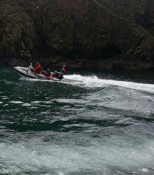 Testing the trouble-some Tohatsu in a sheltered cove in the Bullers of Buchan.